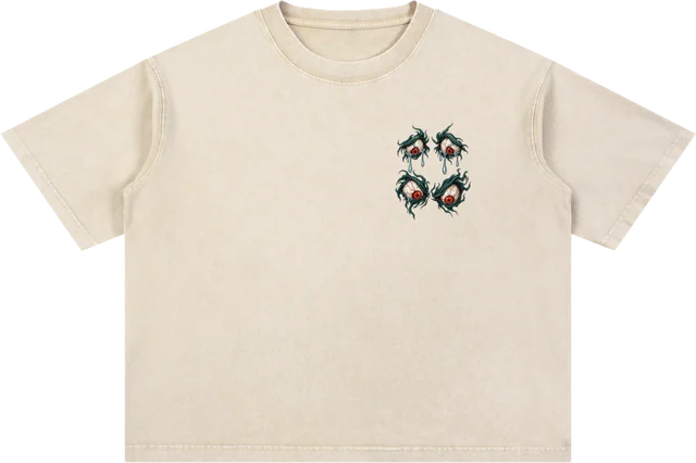 Dripping Eyes tee on bone. The letters melt and the eyes stay open.